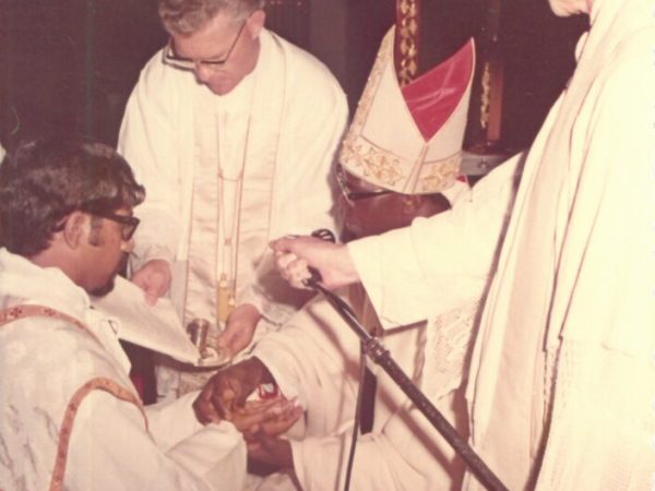 At the moment of Anointing! His Eminence with His Priest.