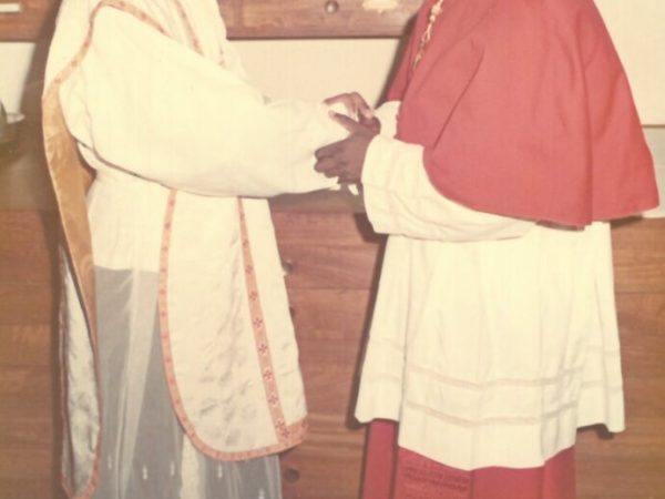 His Eminence Michael Maurice Cardinal Otunga congratulates His New Priest.